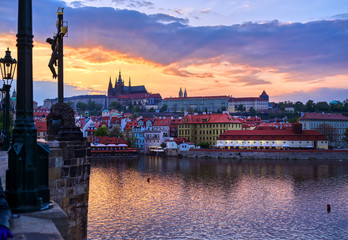 A view of Prague Castle and the Charles Bridge across the Vltava River in Prague, Czech Republic.