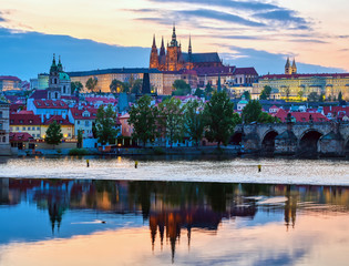 A view of Prague Castle and the Charles Bridge across the Vltava River in Prague, Czech Republic.