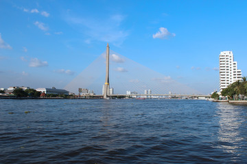Obraz premium River view, overlooking the bridge over the Chao Phraya River at Bangkok, Thailand