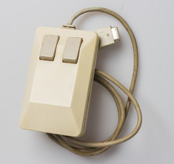 Old technology Retro Vintage computer PC desktop mouse off-colour beige very dirty, grimy, filthy old obsolete technology historic equipment technology with new mice being almost the same