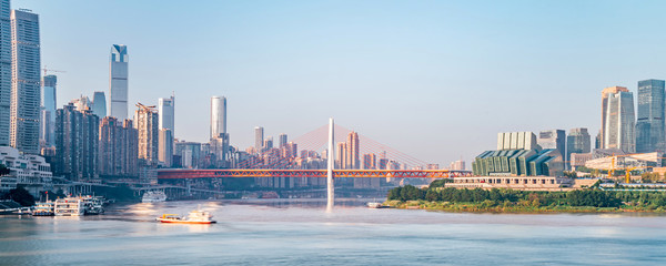 A close-up of the sunny scenery of high-rise buildings and Bridge cities in Chongqing, China