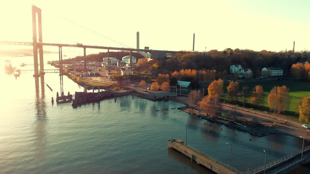 Aerial Dolly view of Alvsborg bridge in Sweden during beautiful sunset.