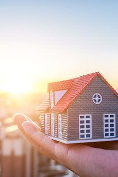 A small house in hand -- concept picture of buying  house