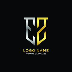 Abstract letter EZ shield logo design template. Premium nominal monogram business sign.shield shape Letter Design in silver gold color