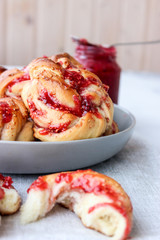 Yeast buns with raspberry jam