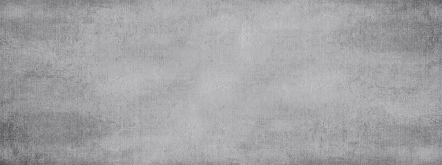 Gray old grunge texture with dark damage.Vintage background.Long wide format.