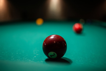 red billiard balls on pool table