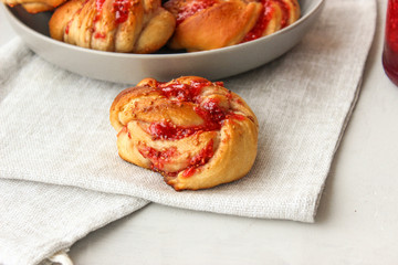 Yeast buns with raspberry jam