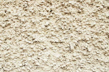 old plastered wall covered with paint
