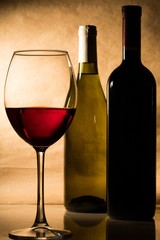 Red Wine Glass and Bottles