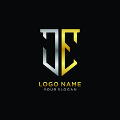 Abstract letter JE shield logo design template. Premium nominal monogram business sign.shield shape Letter Design in silver gold color