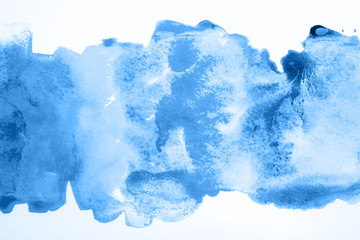 Abstract watercolor background with blue stains. Color of year 2020.