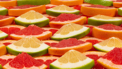 Pomelo and grapefruit slices background.