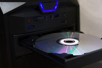 CD  sitting in the computer cd- rom drive.