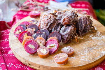 Dried persimmons and churchkhela - Georgian traditional winter holidays sweet dessert.