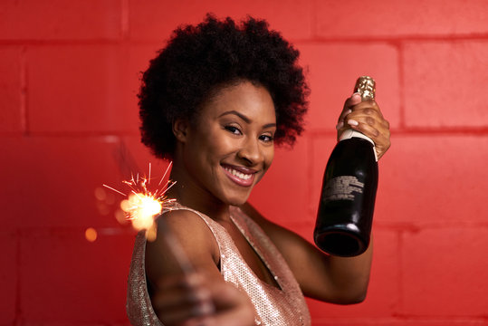 Attractive young african american woman celebrating New year's e