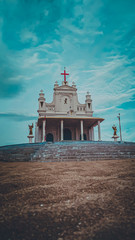 Jesus Crist Church In manapad with a Bule Sky and sand 