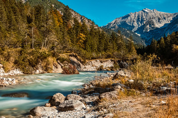 Fototapeta na wymiar Beautiful alpine view with silky water effect at Hinterriss, Tyrol, Austria