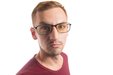 close-up portrait of a guy with glasses on a white background