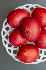 Dyed eggs in onion skins are at the plate