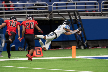 Great action photos of high school football players making amazing plays during a football game