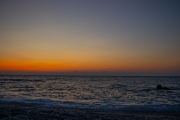 Fototapeta premium orange red sunrise at the beach