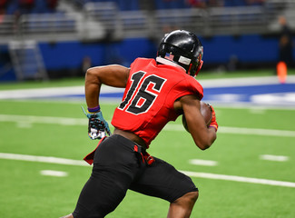 Great action photos of high school football players making amazing plays during a football game