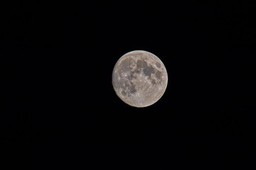 Bright Moon Earth satellite on the night sky