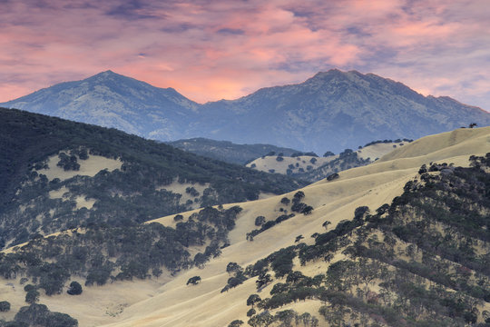 Mount Diablo as seen from the summit of Round Valley Regional Preserve on a summer sunset. Contra Costa County, California, USA.