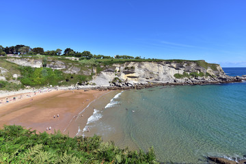 Tourists enjoying hot August weather on Beach Playa de Matalenas in Santander, Cantabria, Northern Spain