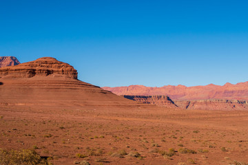 Fototapeta na wymiar Landscape of barren red hillside and terrain at Marble Canyon in Glen Canyon National Recreation Area in Arizona