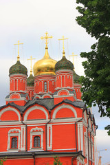 Fototapeta na wymiar Church of All Saints na Kulichkakh on Slavyanskaya Square in Moscow, Russia. Christian church vertical view in Moscow city center