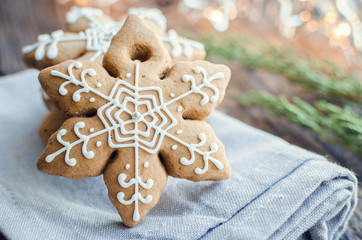 Christmas homemade gingerbread cookies on wooden table