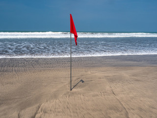 Indonesia, november 2019: The Kuta beach in Bali. White sand and blue ocean