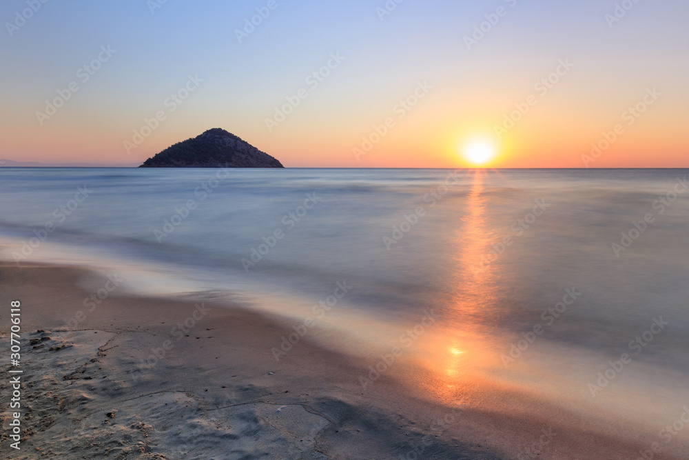 Poster paradise beach at sunrise. greece