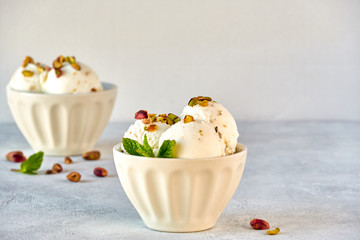 Pictachio ice cream in ceramic bowls close up     