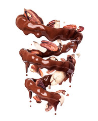 Chocolate splashes in spiral shape with crushed pecan nuts, isolated on a white background