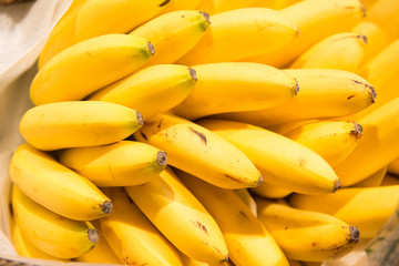 Fresh bananas on the counter close-up. Fruit texture.