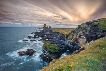 Londrangar basalt rock monolith at the southcoast of Snaefellsness peninsula in western Iceland,...
