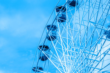 Color of 2020 year, classic blue. Booths on the merry-go-round in Ferris wheel Park. Trend color. ferris wheel,