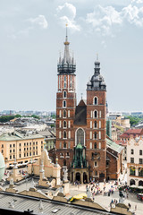 Gothic St. Mary's Basilica and cityscape in Krakow, Poland from Town Hall Tower