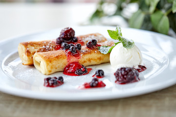 pancakes with berries and ice cream