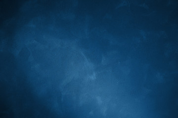 Dark blue background with sun spots. Color of the year 2020 Classic Blue pantone