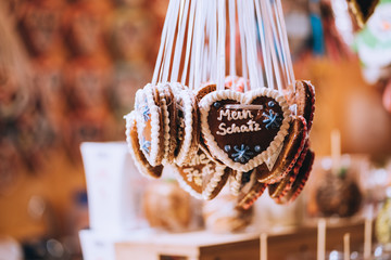 Gingerbread Hearts at Christmas Market in Germany. Inscription means 