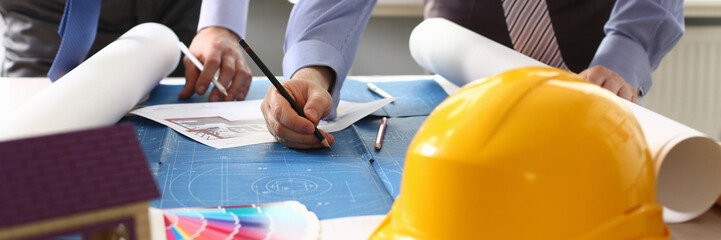 Architect Engineer Sketching Construction Project