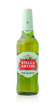 bottle of Stella Artois beer NON ALCOHOl on a white background. The famous brand Anheuser-Busch InBev, is a pilsener brewed in Leuven, Belgium, since 1926