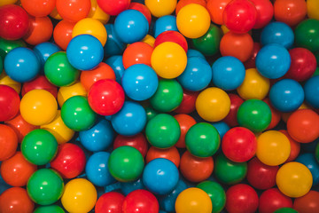 Fototapeta na wymiar Close up of multicolored ball pit balls