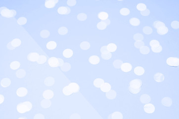 Light background in classic blue with confetti.