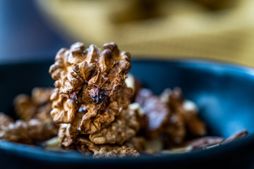 Walnut Kernels and Whole walnuts in Porcelain Bowl.
