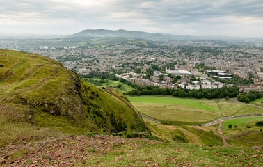 Fototapeta na wymiar Landscape of Edinburgh city in Scotland from Arthurs Seat in overcast weather
